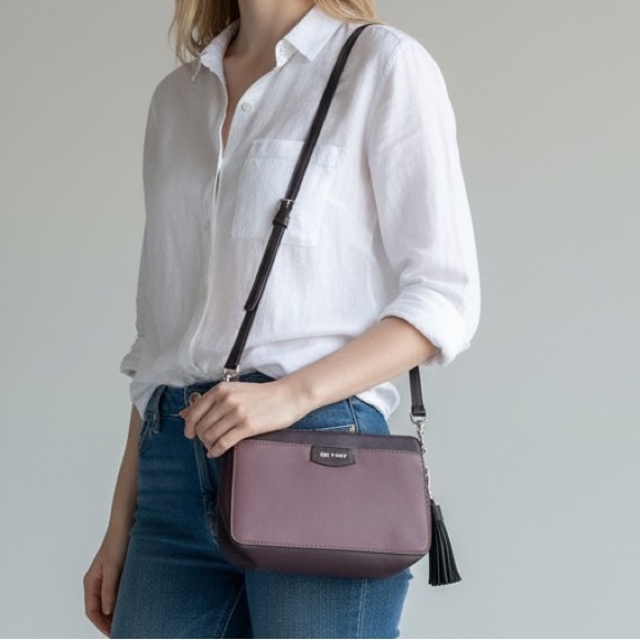 Nine West Handbags - Nine West Plum Crossbody Bag Purple Leather Tassel Adjustable Strap